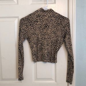 Brandy Melville cheetah print turtleneck top